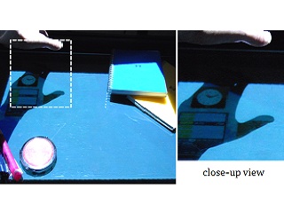 インタラクティブテーブルトップのための補色偏光投影による実影のみでアクセス可能な映像情報隠蔽 (037)